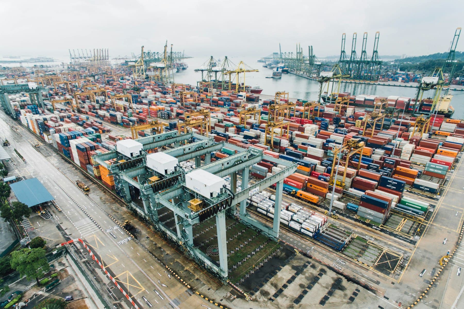 Aerial view of a container port stacked with shipping containers